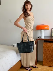 Elegant champagne satin camisole and wide-leg pants set for women lifestyle view