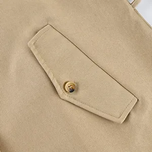Detailed close-up showing the pocket and amber button on a khaki sanded velvet trench coat
