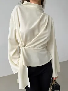 Elegant apricot French chiffon blouse featuring a stylish waist knot and drape detail