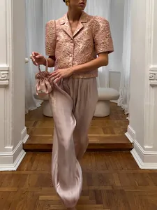 Chic relaxed-fit wide-leg lantern pants with a silky metallic pink finish for summer.