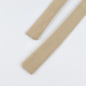 Detailed macro view of khaki suede belt for trench coat with fine twill texture