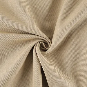 Close-up macro of khaki frosted velvet fabric texture for autumn trench coat detail