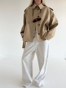 Chic camel-colored frosted velvet lapel windbreaker jacket styled with white pants