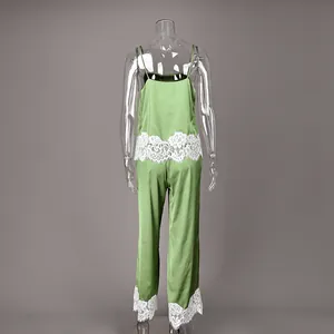 Rear view of light green satin pajama set featuring exquisite white floral lace trim detail