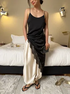 Elegant cream satin lantern pants for women featuring a smooth drape and loose fit design