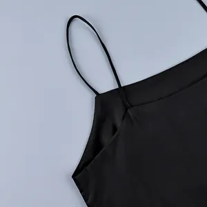 Close-up of black camisole shoulder strap and flat neckline stitching detail