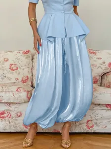 Elegant light blue shiny lantern pants with loose casual wide-leg design for women
