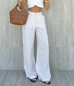 Women's high-waisted white wide-leg linen trousers with elegant pleated front detail