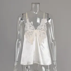 Detailed view of sexy white lace V-neck camisole with delicate satin finish