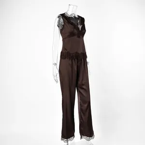 Dark brown satin pajama set featuring a V-neck lace camisole and straight trousers