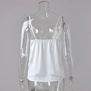 Detailed back view of a white lace patchwork satin camisole top with thin straps