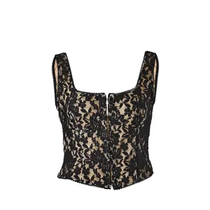 Detailed view of a stylish black floral lace corset top for women with nude lining.