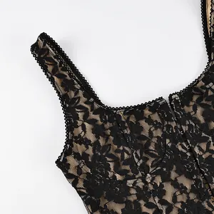 Detailed close-up of a black floral lace camisole featuring a hook-and-eye front closure