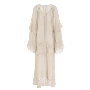 Back view of a khaki long ruffle dress made of lightweight semi-sheer chiffon fabric
