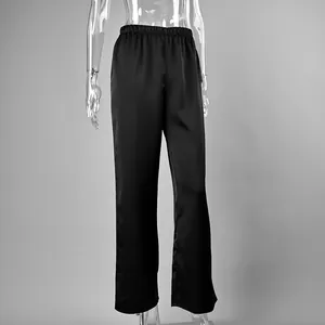 Elegant high-waist satin straight-leg trousers in black with elastic waist.