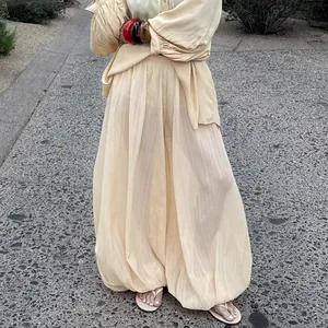 Stylish summer loose light beige balloon harem pants with gathered ankles for women