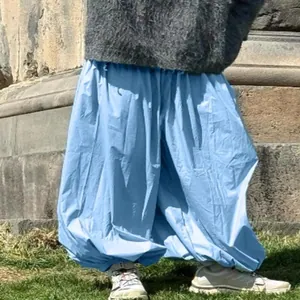 Stylish light blue balloon pants for women with oversized wide-leg harem design for casual wear