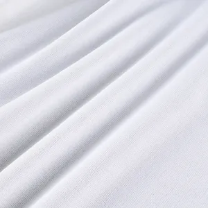 Macro view showing the breathable white fabric texture of high-waist wide-leg pants