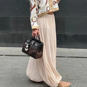 Elegant summer beige loose bubble hem pants with a unique pleated texture for women