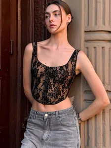 Fashionable black lace corset tank top featuring elegant floral patterns and slim fit