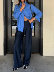 Elegant high-waisted satin trousers with a smooth drape and straight-leg fit for daily wear.