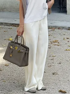 Elegant high-waisted satin wide-leg trousers with premium drape for women