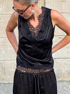 Elegant black satin two-piece set with V-neck lace trim top and straight pants.