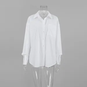Front view of an oversize boyfriend style white shirt on a transparent mannequin.