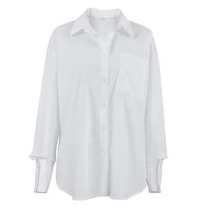 Close-up front view of an oversized white boyfriend-style long-sleeve shirt for women