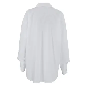 Back view detail of an oversized white boyfriend style shirt for women's casual fashion