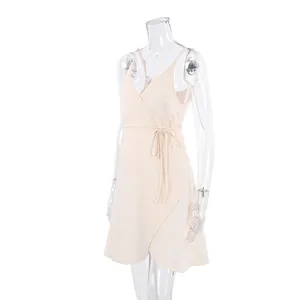 Elegant cream V-neck cotton crepe wrap mini dress with waist tie detail for summer wear