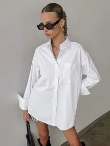 Minimalist oversized white boyfriend shirt for women, mid-length casual button-down style