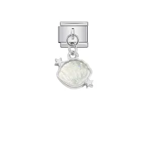 Close-up of a silver stainless steel shell charm for Italian modular charm bracelets