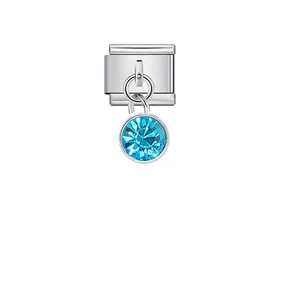 Close-up of Italian charm link with dangling light blue round crystal pendant