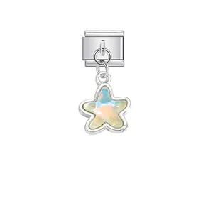 Close-up of a stainless steel Italian modular charm with iridescent star pendant