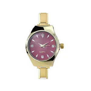 Macro view of gold stainless steel modular links and elegant purple watch dial
