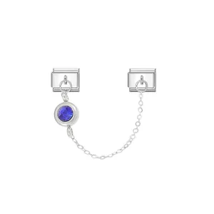 Detailed macro view of silver Italian modular charm featuring a blue birthstone and chain.