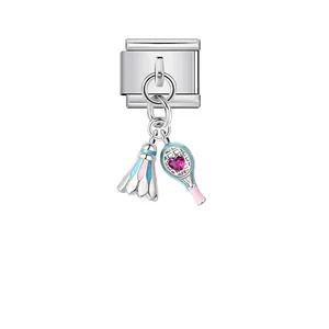 Close-up detail of Italian modular charm with shuttlecock and tennis racket charms