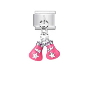 Detailed macro shot of pink boxing glove charm with Italian modular stainless link