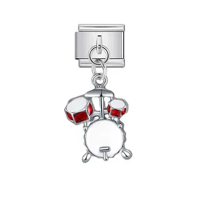 Detailed macro view of a silver drum kit musical instrument charm for modular bracelets.