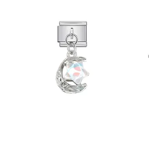 Macro view of stainless steel moon and iridescent star charm for Italian bracelet