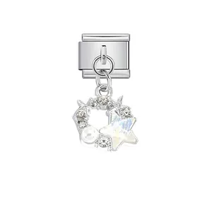 Detailed view of stainless steel star and moon charm for Italian modular bracelets