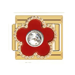 Close-up of gold stainless steel Italian charm with red flower and rhinestone