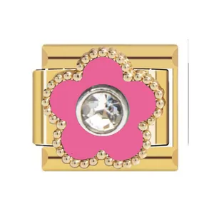 Detailed view of a gold Italian charm with a pink flower and rhinestone center