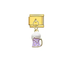 Close-up detail of golden Italian modular charm link with a purple beer mug dangle