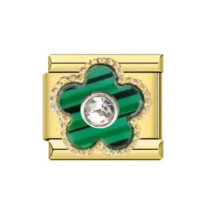 Close-up detail of a gold stainless steel Italian charm link with green striped flower