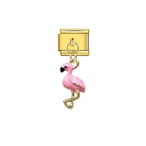 Detailed view of pink flamingo dangle charm on gold plated Italian modular jewelry link