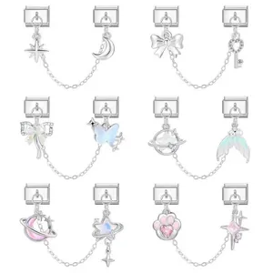 Detailed view of silver Italian charm bracelet links with double chains and mixed pendants