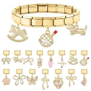 Bracelet à charms italien doré élégant avec divers pendentifs d'animaux et de nœuds