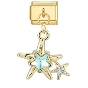 Gold-plated Italian modular charm featuring a dangling blue star crystal starfish design